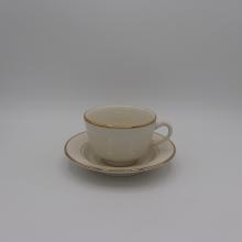 Ivory cup and saucer with Gold Band