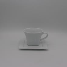 White cup and square saucer